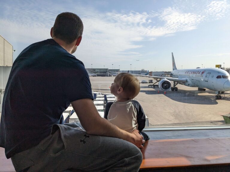 flying with kids - tips for surviving layovers with kids (looking at planes)