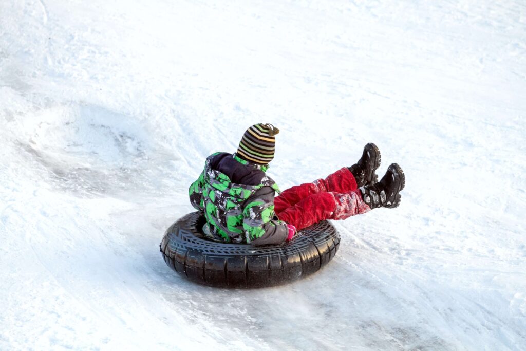Going to the Plains of Abraham is one of the best things to do in Quebec City in winter with kids - a great spot for snow tubbing