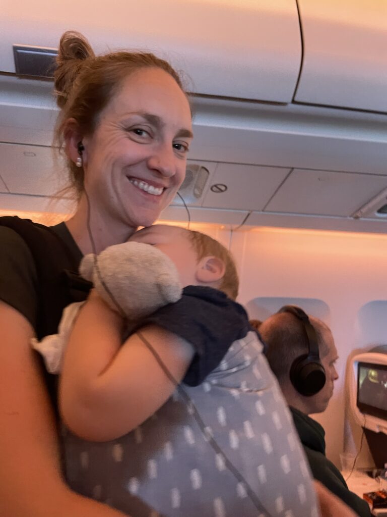 The most important travel item when flying with a baby is the best travel baby carrier.