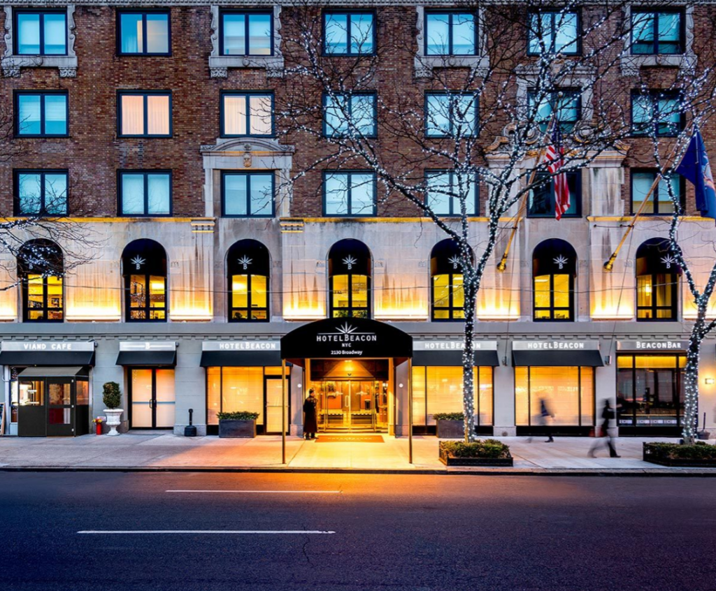 Facade of the Hotel Beacon, one of the best hotels for families in NYC, during the Holiday season.