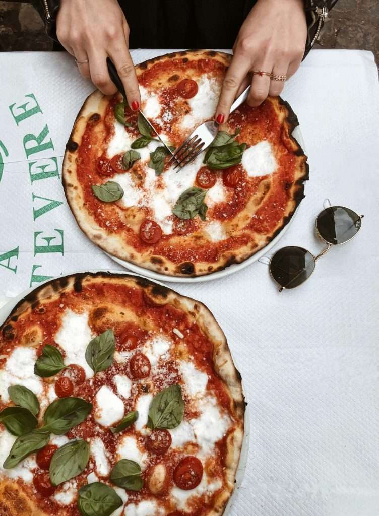 September in Rome is the perfect weather to indulge true Italian pizzas on charming terraces.