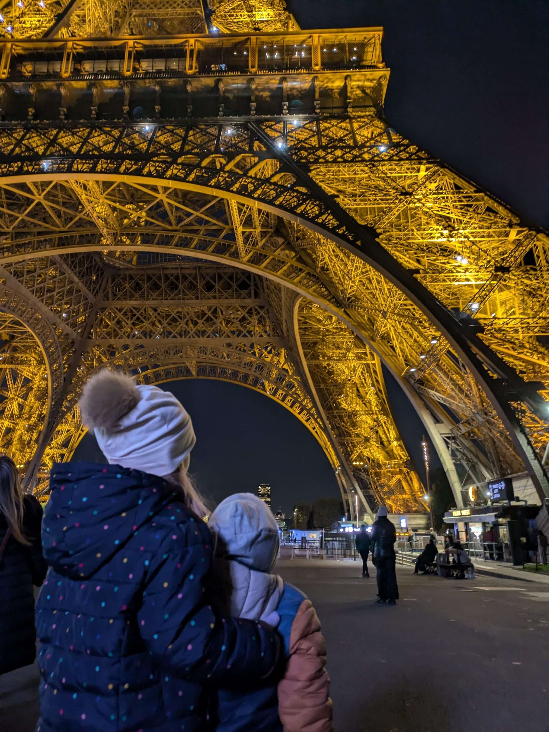 Watching the Eiffel tower lights up is one of the best things to do in Paris at night with kids