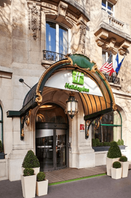 The front door with the Holiday Inn logo above at the entrance of the Holiday Inn Gare de Lyon - Bastille in Paris.