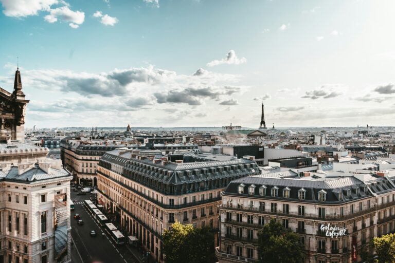 Views of Paris skyline from the rooftop of Galeries Lafayette on a sunny day.