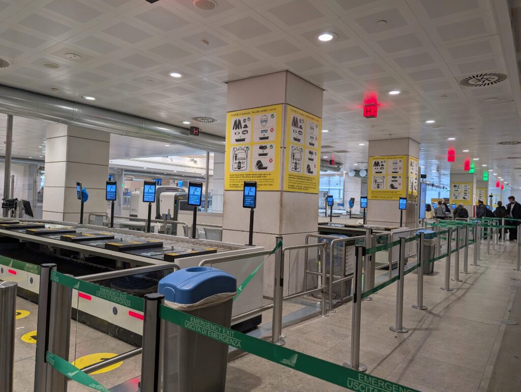 Airport security lines and machines.